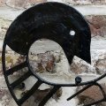 Iron sankofa symbol